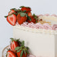 Strawberry buttercream Mother’s Day cake with fresh berries