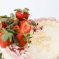 Fresh strawberry topped cake with Mother’s Day topper