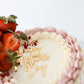 Close-up of strawberries and gold Happy Mother’s Day topper