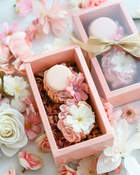 Mother’s Day cakelet gift box with edible flowers and macaron topper