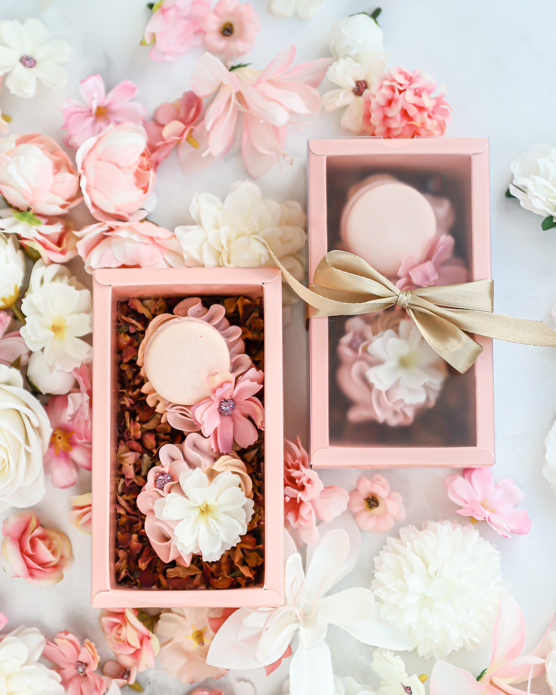 Elegant floral cakelet box styled with pink and ivory spring flowers