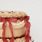 Sweetie Pie cherry vintage lattice cake showing cream ruffle band, red gingham ribbon, and scalloped base border detail